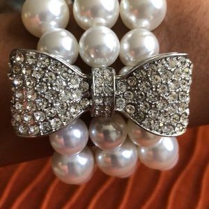 White House Black Market Jewelry - Pearl and diamond bow stretch bracelet White House Black Market Jewelry - Pearl and diamond bow stretch bracelet